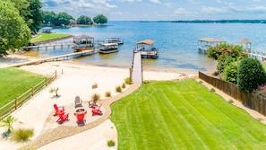 Big water views, beach, fire pit and dock.
