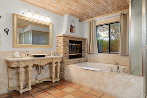 jacuzzi tub with fireplace