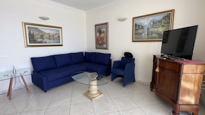 Newly refurbished living room with a comfortable sofa-bed