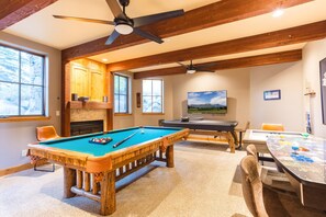 The Ultimate Game Room - 
Pool table, arcade games, TV, air hockey, ping pong, and more—this room has something for everyone.