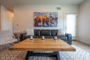 Chunky wood and steel furnishings.