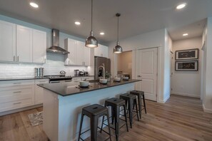 Perfect view of the kitchen, laundry room and pantry.