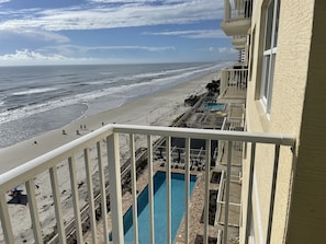 Southern view of the oceanfront balcony showing the pool