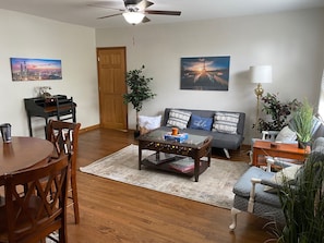 Nicely Furnished Living Room with new double futon. Let the memories begin! 