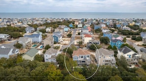 Oceanside home with multiple paths to the beach, which is a quick 5-7 minute walk away