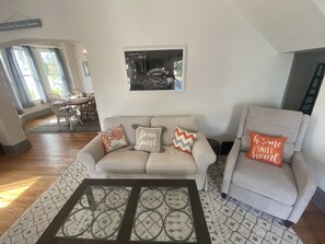 View of living room with dining room in sight