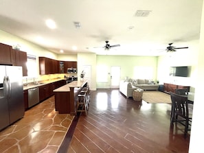 spacious living area open to kitchen.