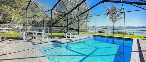 Screened in heated pool and out to the lake!