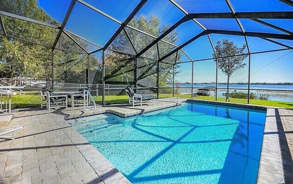 Screened in heated pool and out to the lake!