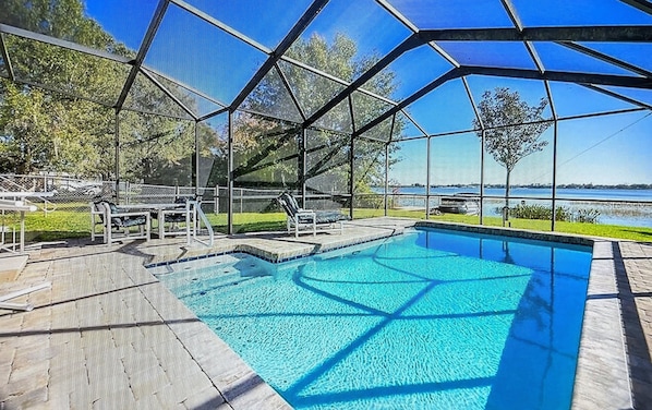 Screened in heated pool and out to the lake!