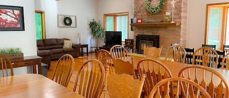 Upstairs dining room (seats 31 permanently) w/ living room in background