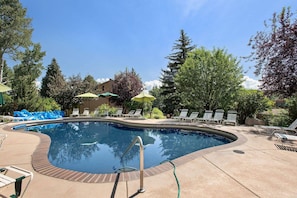 This large outdoor pool is open in the summer months for your enjoyment!  The pool is located right next to your building!