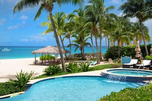 Enjoy the pool, heated spa, and beachfront views!