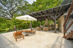 Gorgeous Patio with Firepit and Seating with a beautiful view of the river