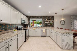 Open-concept kitchen and dining area