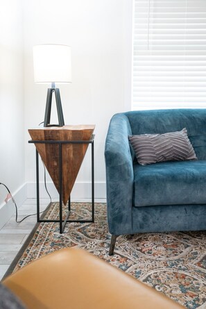 Artist's choices are in the living room in artful abode, close to downtown. 
