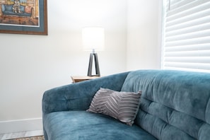 Artist's choices are in the living room in artful abode, close to downtown.