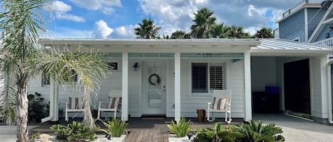 The ultimate modern beach cottage in an ideal setting just steps to the Ocean.