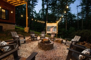 Make memories around the firepit while enjoying your favorite movie