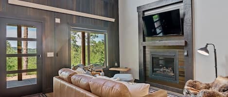 Open living area with huge windows to take in all the views