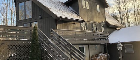 Chickadee Chalet is snowy on the outside and toasty warm inside for gatherings.