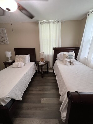 Our twin sized bed holds one each. Each bed is accessorized with pillows.