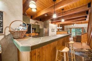 Kitchen bar can be used for seating or as a food banquet serving area