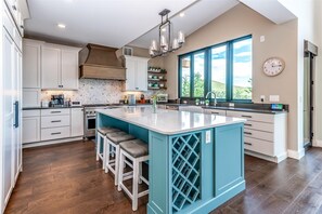 The impressive kitchen comes fully-equipped with all the tools and appliances a chef requires to craft their next culinary delight.