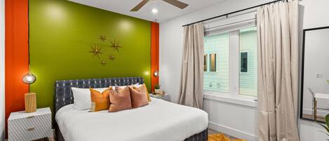 Our third floor master bedroom features a comfortable king bed and a retro-modern feel with a walk in closet and a private bathroom with a walk-in shower!