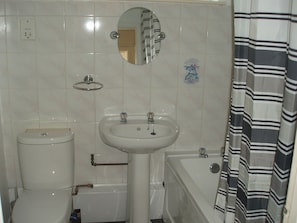 Bathroom / bath with shower