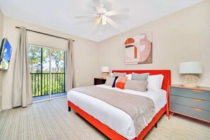 King bedroom with smart TV and en-suite bathroom