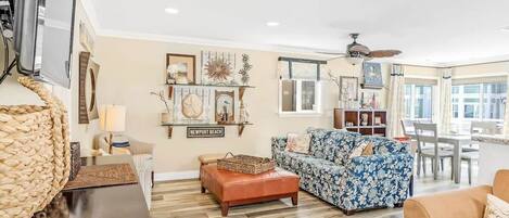 A big bright open airy living room on main floor