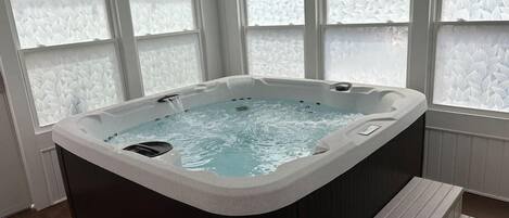 Welcome to our brand new spa room! Brand new hot tub installed indoors so weather is never a factor in deciding to use it! Hot tub towels are provided. Just bring your swim suit!