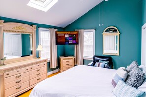 King bedroom with TV