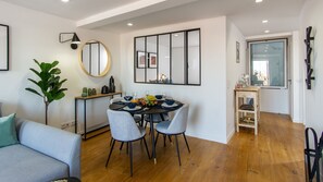 The dining table can comfortably accommodate four people; perfect for an intimate dinner with your loved ones! #airbnb #airbnblisbon #portugal #pt #lisbon