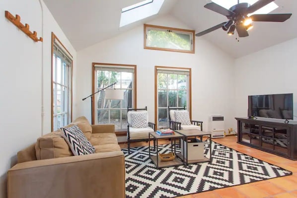 Bright & airy living room with skylights.