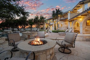 Fire pit lit at sunset