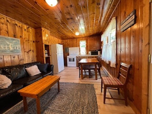 Open living space in No. 8 cabin with new flooring