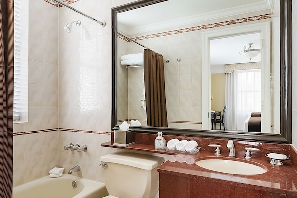 Full bathroom with bathroom essentials