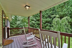 Enjoy the rocking chairs on the front porch overlooking the front yard