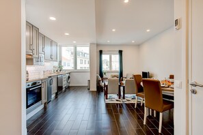 Sunny kitchen and living room.