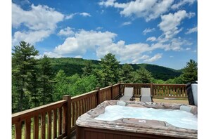 Private Hot Tub with view of the mountains and stars.