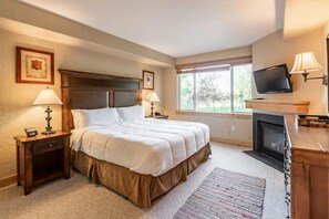 Rest peacefully in the primary suite, complete with a king bed, TV and fireplace