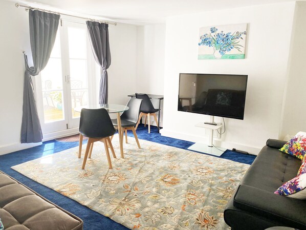 Dining Table seats 4. 
Two x 3 seater sofas.
Flat Screen TV and stand