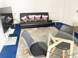 Dining Table seats 4. 
Two x 3 seater sofas.
Flat Screen TV and stand