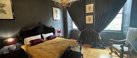 Master Bedroom with lush velvet curtains