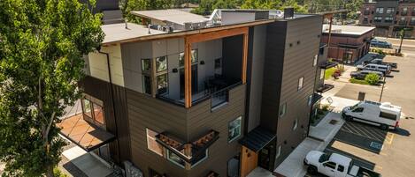 Exterior of the building, porch and unit are on the 3rd floor.