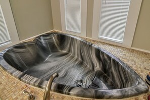 Unique heart shaped bathtub with whirlpool jets!