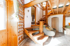 The left side is a private room on the mezzanine floor (1 double bed), and when you go up the stairs, the right side is a loft with 2 single beds.