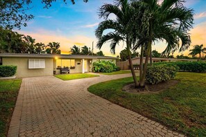 Your next vacation awaits at this private oasis on a quiet family oriented street, close to the beach.